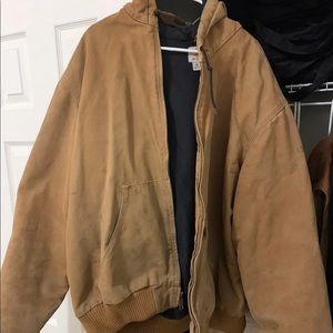 Carhartt lined work jacket. Worn and used but with no rips or tears.